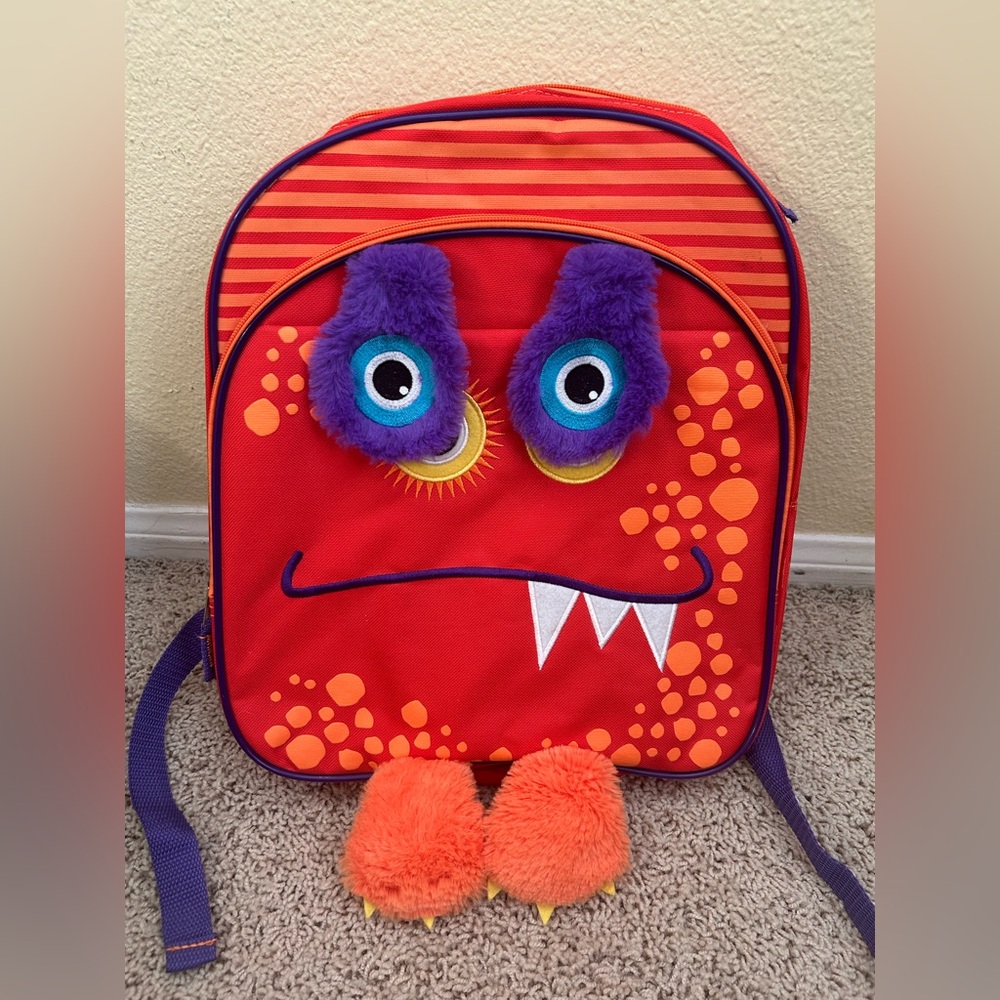 NWT New with tag Flipeez Orange monster squeeze pump kids toddler backpack